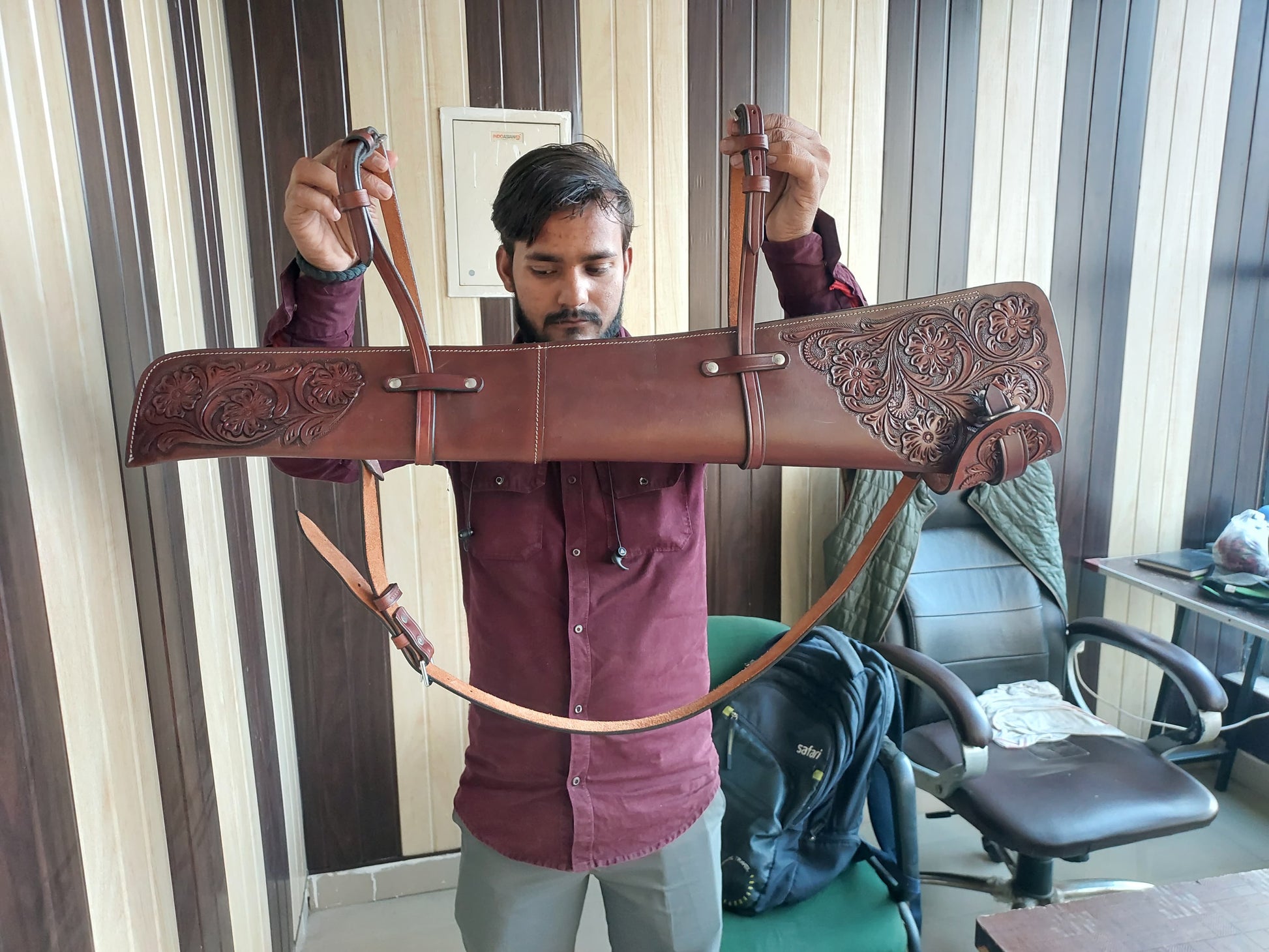 Hand-tooled leather rifle scabbard 33 inch long

Western leather gun cover with adjustable straps

Full grain leather rifle case for lever action rifles

Cowboy-style rifle scabbard for Marlin and Henry

Floral carved rifle cover with buckle flap

Handmade brown leather gun case for saddle mount